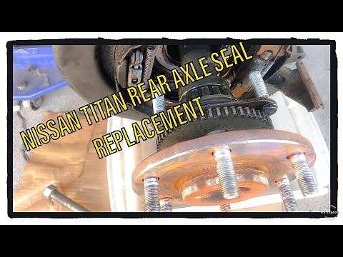 Nissan Titan Rear Axle Seals and Bearings Replacement - How To Save Hundreds of Dollars $$$
