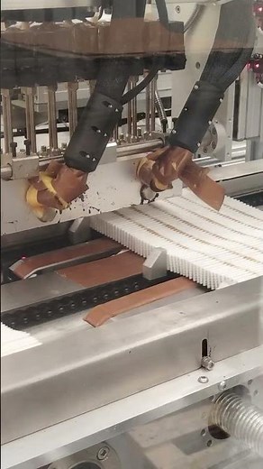 Automated hot melt adhesive application system improves filter assembly efficiency.