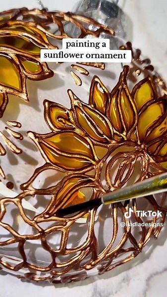 Painting a sunflower ornament 🌻 Something a little different for Christmas, but i love how it turned out. This year I'm handpainting 2 different styles of personalized ornaments. They launch today on my website! More designs and color options will be available. Custom requests will be open as well! Order by Nov 15 for Christmas delivery. If you have questions, feel free to DM me. 💕 #painting #sunflowers🌻 #stainedglassart #christmasornaments #giftsforher