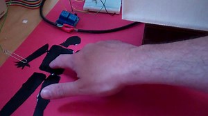 Saul Bass inspired capacitive touch light switch made with Bare Conductive conductive paint!