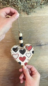 These Dollar Tree hearts are fun to redo. I took the entire sign apart today and prepped all the hearts. This time I used a printable from Lisa’s Crafting Closet. It turned out so cute. Let me know what you think. 🤎❤️🖤#dollartreediy #dollartreecrafts #valentinesdaygiftideas #craftideas #heartcrafts | Farmhouse Stencil Shoppe