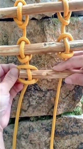 make a hanging ladder by tying a rope to wood