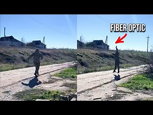 Ukrainian Soldier Intercepts a Russian drone by cutting its fiber optic cable with his bare hands.