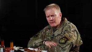 It's getting spicy in here. 🔥 Brig. Gen. Paul Birch gets personal while eating HOT wings. Watch to see if he can beat the heat! 🥵 | Andersen Air Force Base
