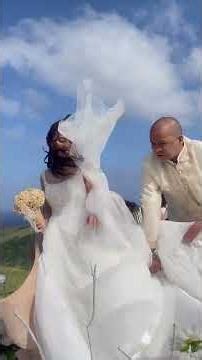 Strong winds disrupt outdoor wedding procession in Basco, Batanes, Philippines
