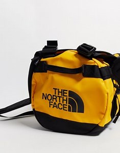 The North Face Base Camp extra small 31L duffel bag in yellow | ASOS