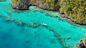 Soar Above Fiji's Serene Seascape with Dazzling Drone Views