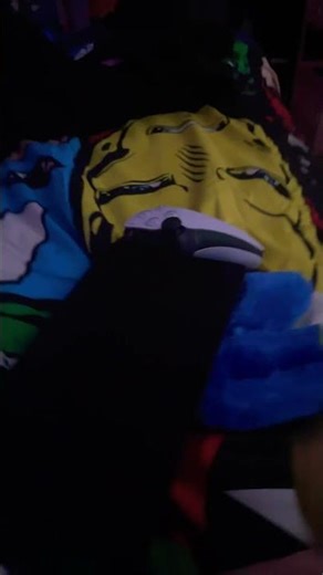 Beating him with a portable ps5??