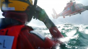 Watch Coast Guard rescue swimmer training from inside the MH-65 helicopter