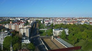 Last piece of original wall. Breathtaking aerial top view flight Berlin Wall Memorial Border crossing zone, city district Mitte, Germany spring 2023. panorama overview drone 4k uhd cinematic footage.