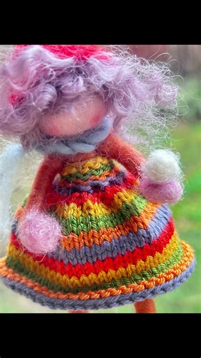 A winter fairy holding a snowball, wearing a dress I knitted stitch by stitch. Some stories are made of wool, patience and a little bit of magic. ❄️🧶 #needlefelting #handemadewithlove #WinterVibes #handmadedoll #knitting