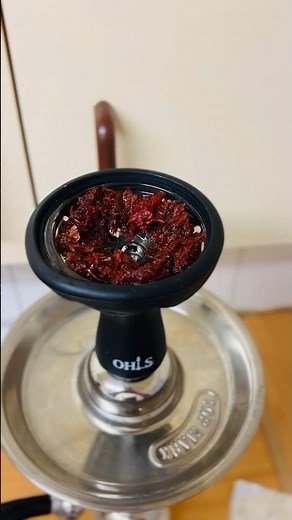 Setting up shisha (hubbly bubbly)