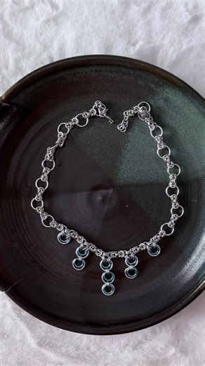 Geeky Links on Instagram: "I’m way better at making chainmaille than photographing it, but these deserved to be shared anyway. Here are a few handmade chainmaille necklaces, each one crafted link by link. They’ve got that bold, slightly edgy vibe that still feels wearable every day. They’d make a unique gift, whether it’s for someone special or just for you. Want to see more of what I’ve been working on lately? #chainmaille #chainmail #handmade #necklace #jewelry"