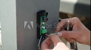 Electrician installs wiring using Connectors for connecting wires in automation and electronics equipment. Connection of electrical wires of electrical appliances