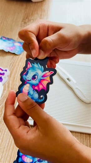 FondMemories | Handcrafted Custom Magnets on Instagram: "This is called Scoring! One of the things we learnt early on in this journey was to never miss this step while creating magnetic bookmarks. In this video this 9 year old is using her mini scoreboard to create a perfect crease to fold the laminated bookmark for a professional look. #youngentrepreneur #bookmarks #magneticbookmarks #kidprenuer #trusttheprocess"