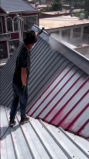 Spraying anti rust coat — sealing and protecting the metal roof #construction #shorts #spraying