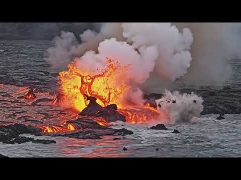 Fiery Lava Flow Into the Sea Creates Incredible Steam Plumes