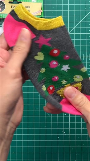 You'll never look at Dollar Tree socks the same way. 😂 Don't ask me why I made these DIY ornaments. The answer is "just because." #dollartreediy #christmascrafts #diyornaments | First Day of Home