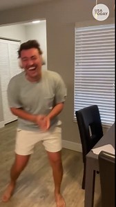 Man jumps for joy after being gifted a surprise puppy for his birthday