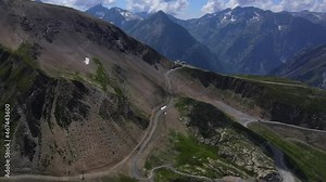 Aerial fly over of Europes highest skiable glacier, 3600 Les Deux Alpes in the French Alps during summertime