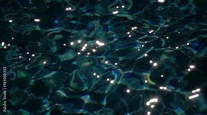 Night swimming pool with clean water. Slow motion