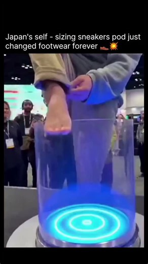 knowledge on Instagram: "Follow) The post showcases a 15-second video of a cylindrical pod scanning a foot and rapidly forming a custom white sneaker around it, hyped as a groundbreaking Japanese footwear innovation with over 8 million views. Community feedback and searches reveal no credible sources or companies behind the tech, with users labeling it AI-generated "slop" amid rising deepfake virality on social platforms. While fictional, it spotlights real trends in 3D-printed custom shoes, suc