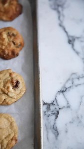 White chocolate cranberry macadamia cookies that will disappear quickly. Here's why these became my most-requested cookie recipe: • Crispy edges chewy centres (the perfect texture combo) • Loaded with white chocolate chunks, tart cranberries & buttery macadamia nuts • They freeze beautifully – both raw dough and baked cookies • 15 minutes prep, then your oven does the work The secret? Melting some of the white chocolate into the batter whilst keeping chunks for pockets of creamy sweetness. It cr