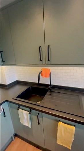 Sage Green and Black Open Plan Kitchen