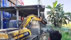 CM N Biren Singh: Build illegally; the bulldozers will pay a visit A community hall constructed illegally in the middle of the road at Hatta Golapati, near the Imphal Riverbank, is being demolished by a team comprising the SDO, SDC, District Police, and PDA. #Manipur #cmnbirensingh #bulldozer #northeastlive | Northeast Live