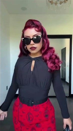 @andreadreaam wearing Morgana in cherry red