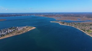 Merrimack River aerial view at mouth to Atlantic Ocean in Salisbury Beach State Reservation in town of Salisbury, Massachusetts MA, USA.