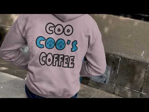 coo coos coffee with paws pink hoodie male backside view