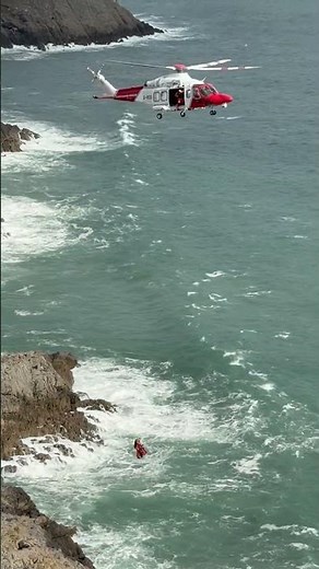 Rock climber winched to safety by HM Coastguard helicopter