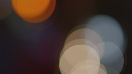 Many colored lights in an out of focus view - Free Stock Video