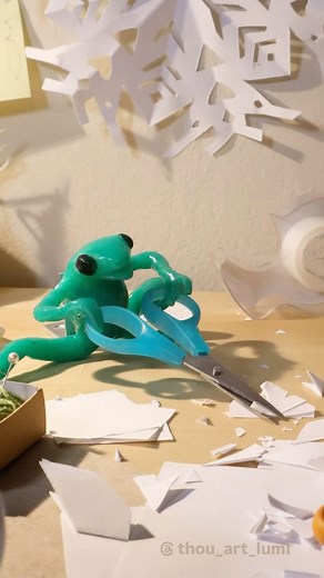 Lumi Barron on Instagram: "❄️☃️🌨️ Got a big paper cut animation in the works and very much wishing for some snow (for the vibes), so frog is helping out on both fronts here! ☃️❄️ . #stopmotion #animation #frog #tiny #snowflakes #snowday #papercraft #papersnowflakes #frogsofinstagram #crafting #winter #cozy #artistsoninstagram #animatorsoninstagram #letitsnow"