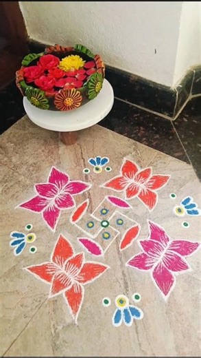 "stunning Multicolour Rangoli #Simple Yet Gorgeous #Lotus🪷Design#Magical colour splash#ytshort#viral