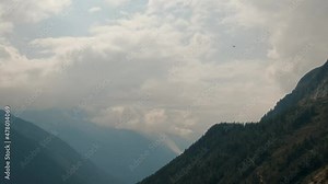 Aerial drone over Chamonix French Alps Mont-Blanc Mountains Foggy Peaks In The Summer