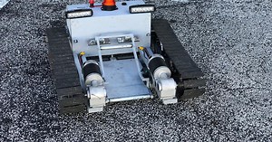 Pulling a Cessna from its hanger with an iPhone-controlled, self-built electric tug