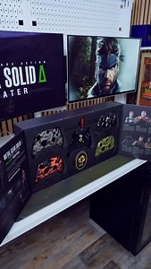 Metal Gear Solid Delta: Snake Eater has officially launched, and GameStop has released a ton of new collectibles to celebrate. Out of everything, I really enjoyed the headset and controller collection the most because they perfectly capture the aesthetic of the game. Which item is your favorite? ——————— Hashtags: #metalgearsolid #mgs #mgsdelta #metalgearsoliddelta #metalgearsolid3 #snakeeater #gamingcollection #limitededition #controllers #controllercollection #collectibles | Unboxed With Josh