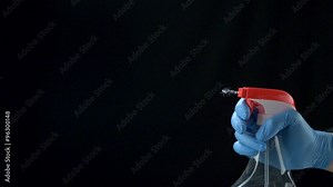 Using spraying bottle and cleaning on black background shooting with high speed camera, phantom flex.