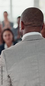Presentation, conference and speaker with audience applause for discussion, workshop and leader. Corporate training, business people and person talking in seminar, tradeshow and convention event