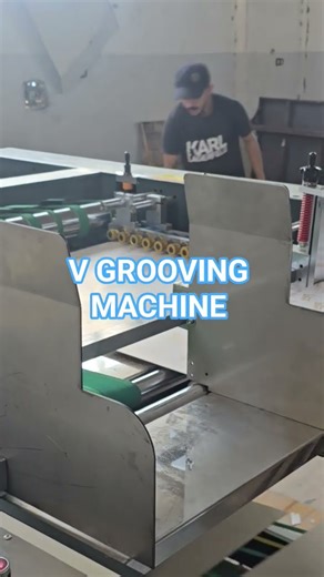 Automatic correction v grooving machine