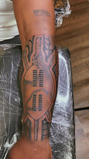 Zulu Shield Tattoo and African Tribal Sleeve by Tattoos By Siaki