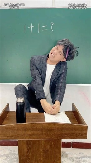 The toy got stuck in the teacher's hair!
