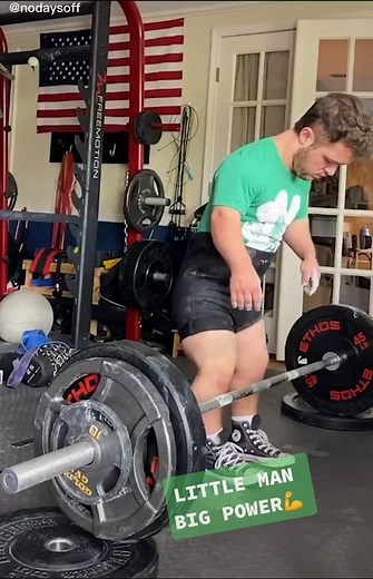Small Man Lifting Heavy Weights - Impressive Strength Display