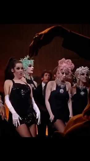 Liz Lange on Instagram: "Suzanne Charny, legendary Ben Vereen and the incredible cast of “Sweet Charity,” 1969. Directed/choreographed by the brilliant Bob Fosse. The style, the look, the TALENT! Truthfully, often long dance scenes in films or plays kinda bore me but this is totally bonkers and totally riveting. Not to mention the fab hair (her high ponytail is everything!) and costumes. Via @neciashairstyling #SuzanneCharny #SweetCharity #1960s #60s classicbeauty #retrochic #jadore #nostalgia #