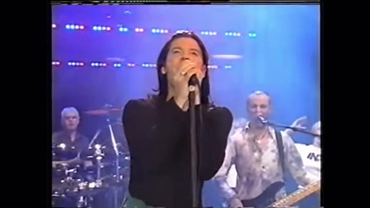 INXS - Need you tonight live In INXS's official autobiography, #INXS: Story to Story, Andrew Farriss said that the famous riff to the song appeared suddenly in his head while waiting for a cab to go to the airport to fly to Hong Kong. He asked the cab driver to wait a couple of minutes while he grabbed something from his motel room. In fact, he went up to record the riff and came back down an hour later with a tape to a very annoyed driver. The song is a much more electronic track than most of t