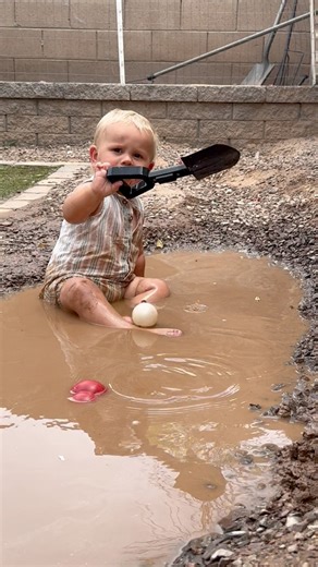 Baby Reece decided right after he got dressed he would like to play in the mud lol! The boys were playing in their splash pad and then decided they were done so we dried off and then put on clothes and then they wanted to go back outside to play with monster trucks and baby Reece made a beeline to mud puddle! When the splash pad overflows it goes right into Logan’s bike track making the perfect mud pool. He got in there so fast I didn’t have a chance to catch him and try to save his clothes, but
