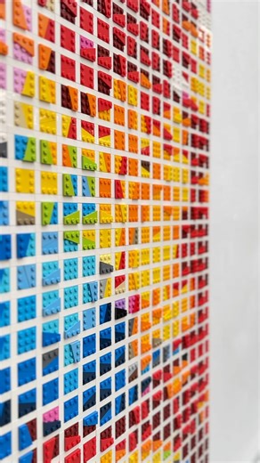 Here's another look at my portrait, "Conner", that I built last year. It's the first portrait I ever made that was comprised of triangular LEGO "wing plates". Thousands of these were arranged on a white grid, which together form a lovely abstract pattern that magically merges into the image of a boy as you walk up to and away from the portrait. 🙂 #seankenneyart #seankenney #artwithlegobricks #lego #legoart #legoportrait #portrait #popartportrait #experimentalart #artstudio #legostudio #legoarts