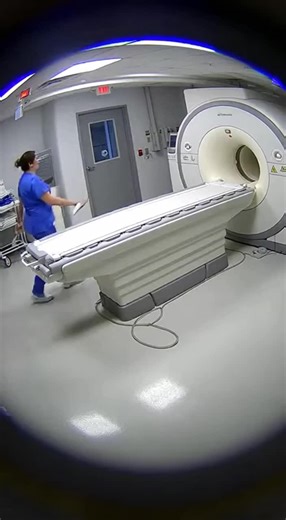 A normal day inside the MRI room suddenly turns into a terrifying moment. A nurse walks past the scanner holding a small metal instrument… but MRI magnets don’t forgive mistakes. Within seconds the machine detects the metal — a warning beep echoes through the room. Before anyone can react, the powerful magnetic field activates. The metal tool flies from her hand and the magnetic force violently pulls her toward the scanner. Her scream fills the room as the magnet traps her arm against the openin